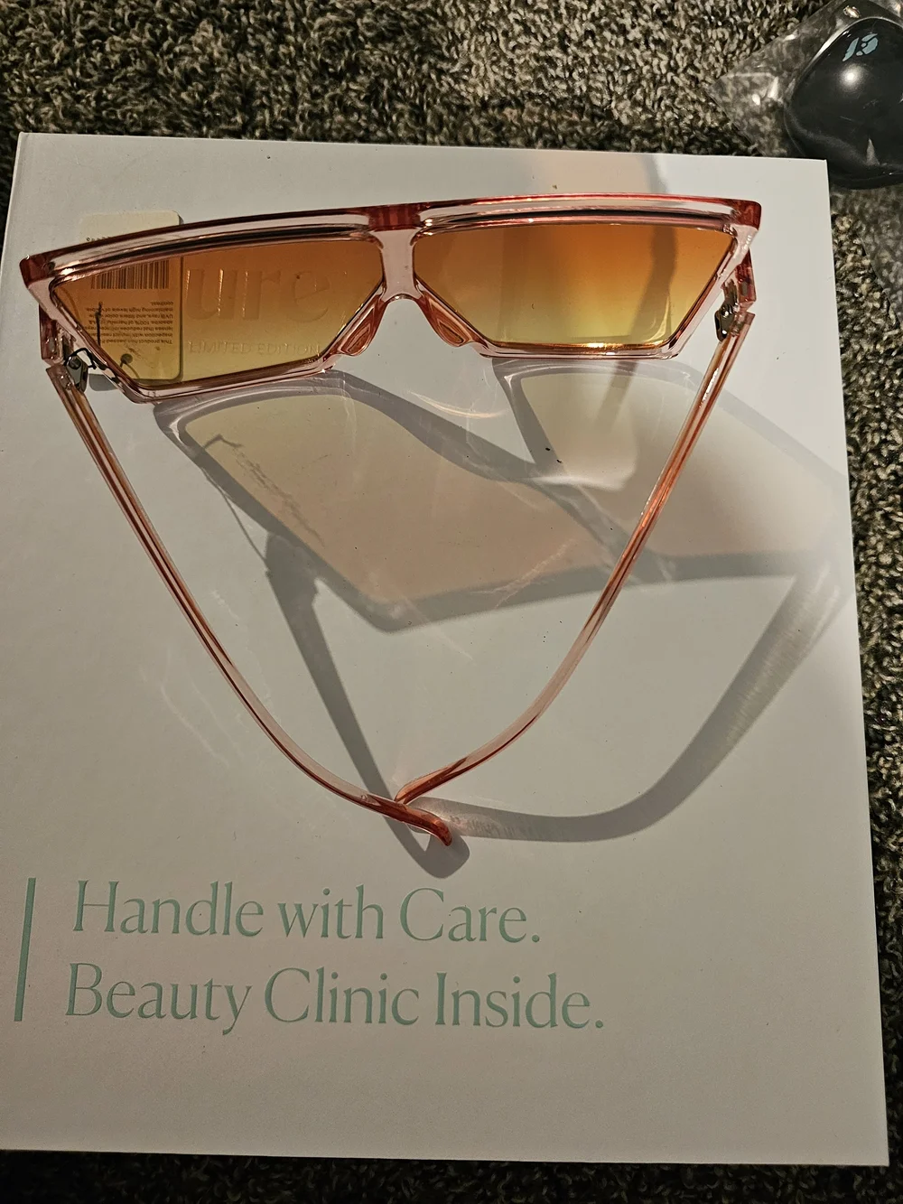 Translucent Pink Shield Sunglasses with Orange Gradient Lenses